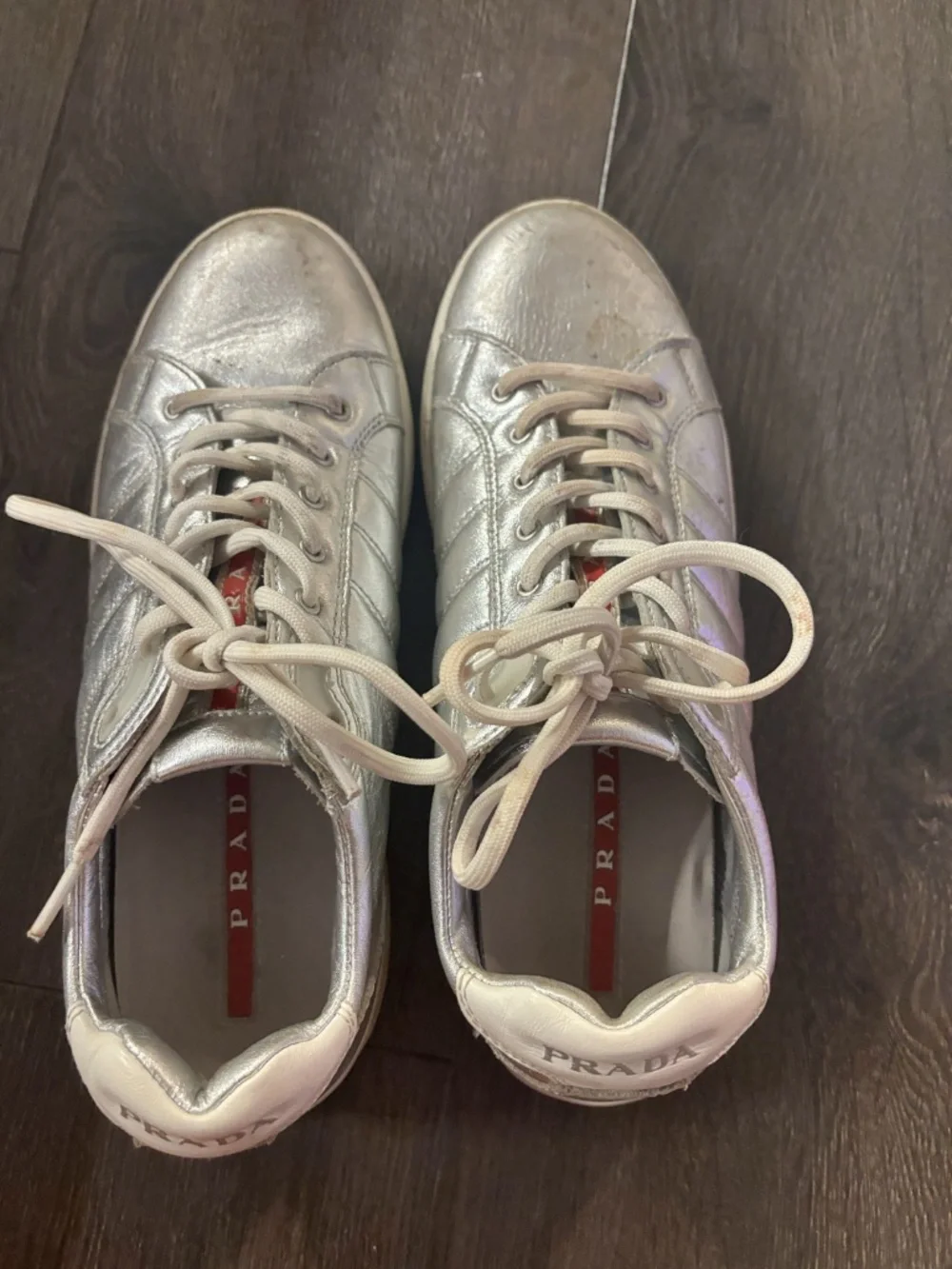 Prada Linea Rossa sneakers in metallic silver leather